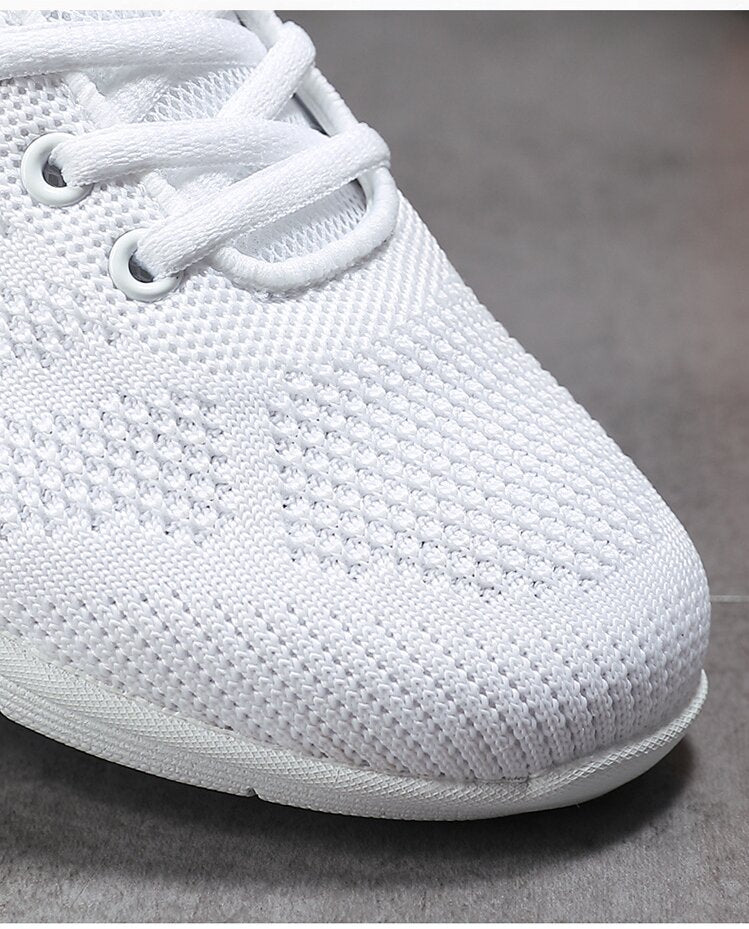 Comfortable cushioned insole of women's white cheerleading shoes