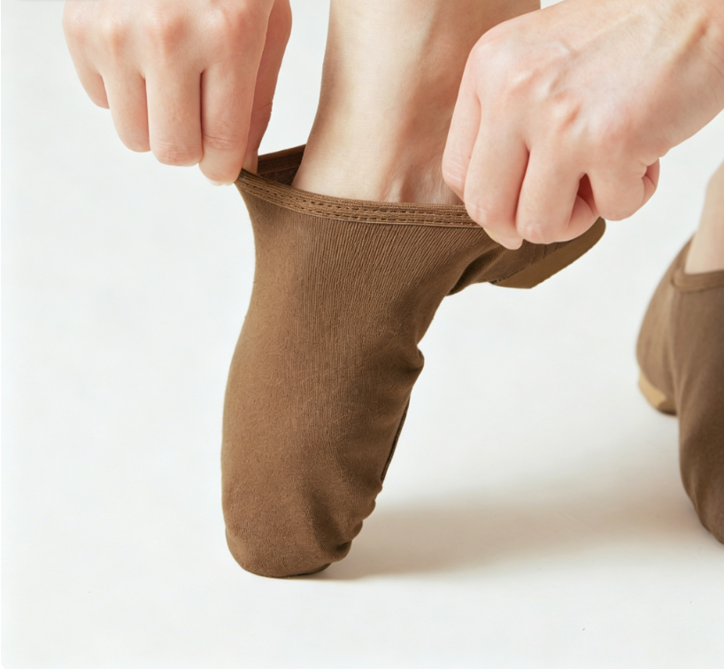 Front view of women's slip-on jazz shoes, barefoot feel design