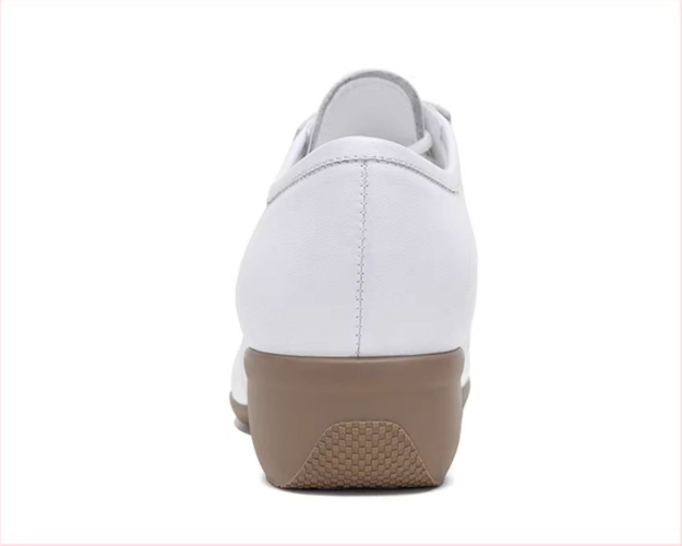 Flexible black dance shoe sole demonstration showing soft bendable material and non-slip texture