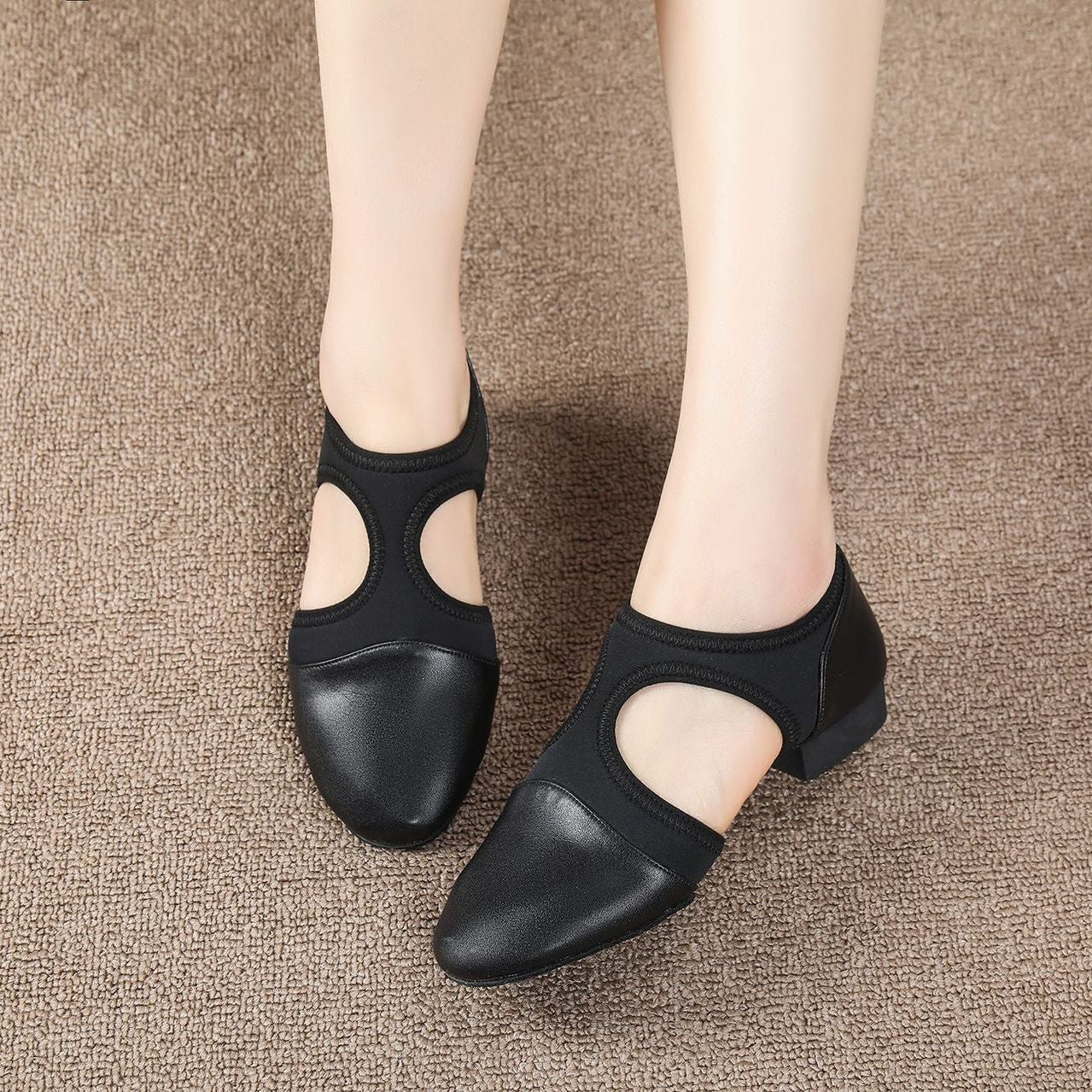 Black leather and elastic jazz dance shoes for class