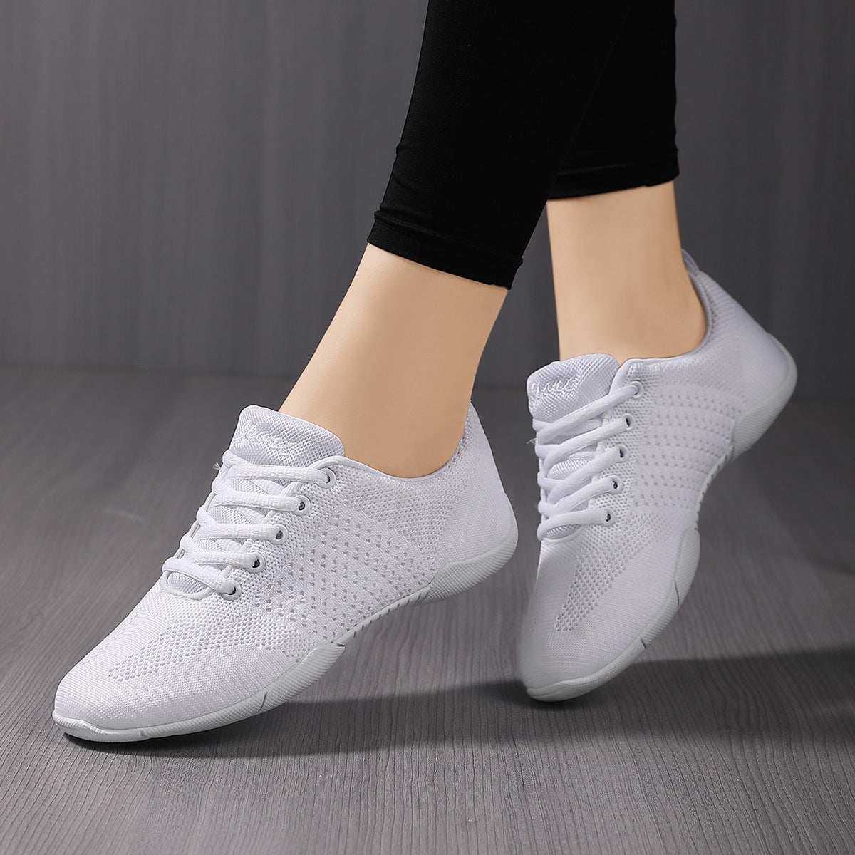 Flexible shock-absorbing sole of white cheerleading shoes