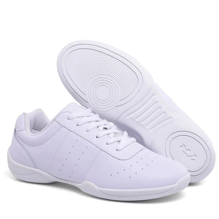 Team cheerleading sneakers in classic white, matching cheer uniforms