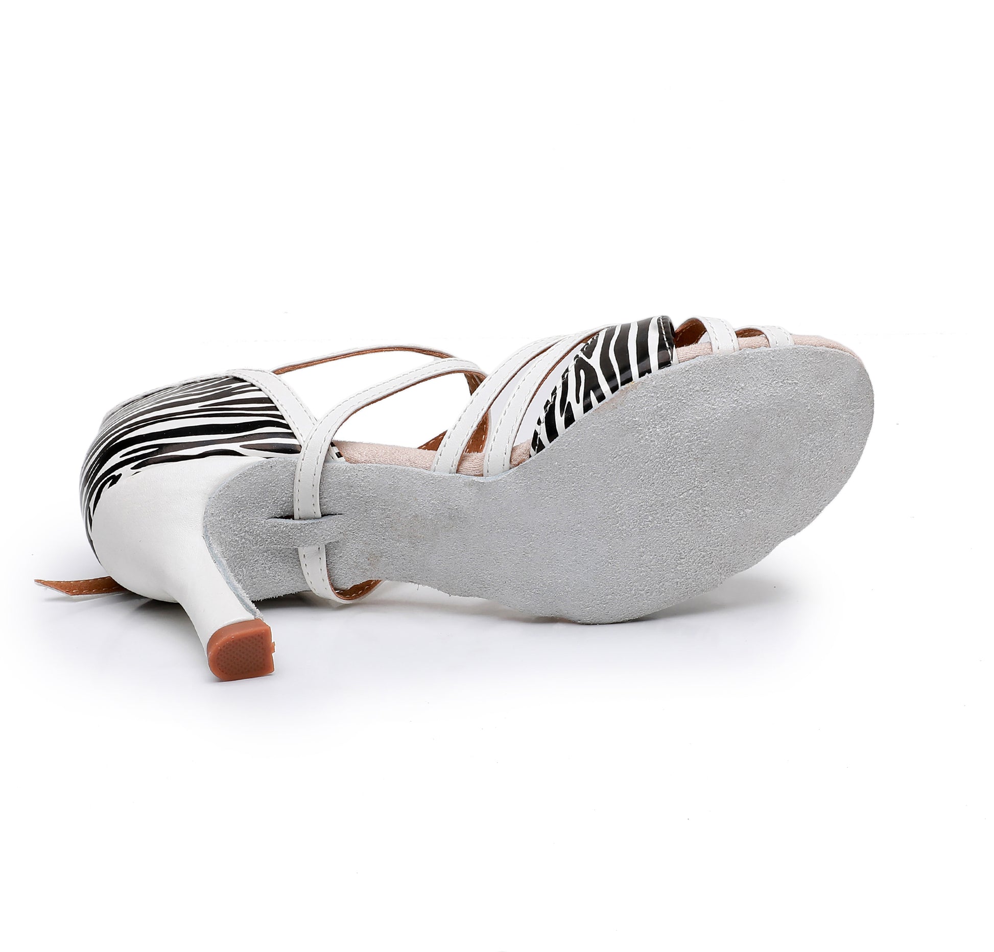 Close up of suede sole on women’s Latin dance shoes for smooth turns
