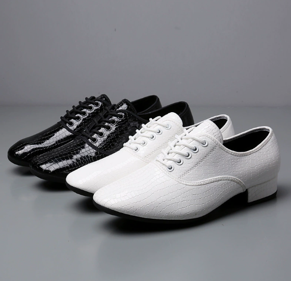 Men's dance shoes in black and white, perfect for all dance styles and occasions.